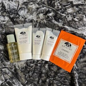 New Origins checks and balances face cleansers (4) & serum sample packets (2)